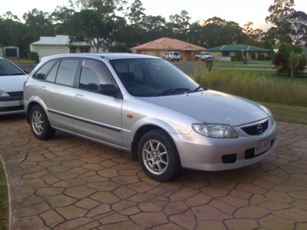 2002 Mazda 323 shades